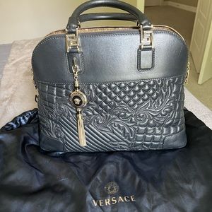 Versace Vanitas black handbag with satchel.AUTHENTIC with receipt and dust bag